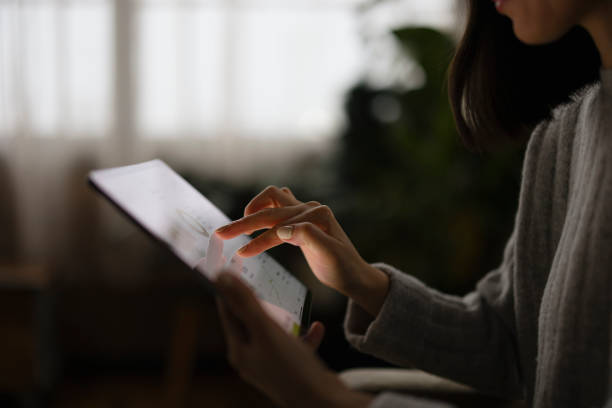 istock Woman Using Tablet in Office with Soft Natural Lighting 2188611264