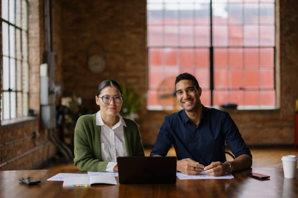 istock Team Meeting in Modern Office Environment with Smart Technology Use 2188611341