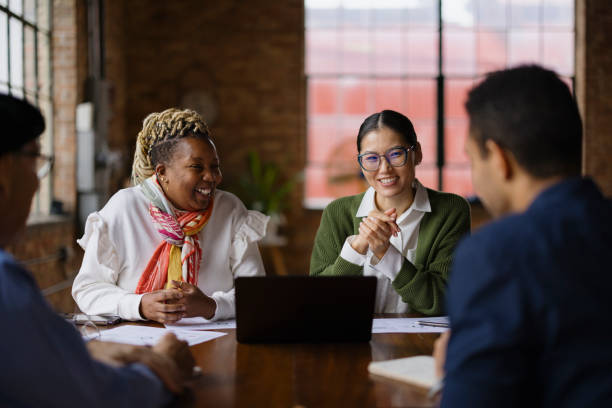 istock Diverse Team Engaged in a Collaborative Meeting in Modern Office 2188611356