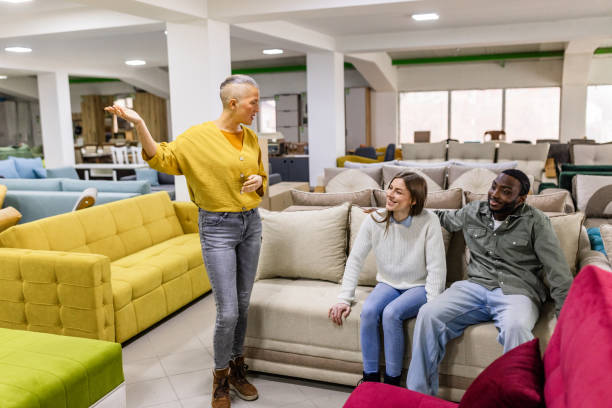 istock Brightly lit store showing a friendly sales interaction. 2188611936