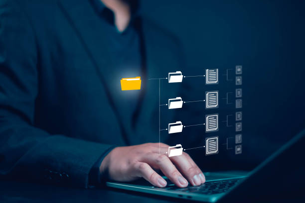 istock Show document management system concept on laptop. Managing corporate file information, document work management with technology software for archiving, document, technology, quality, file 2188622756