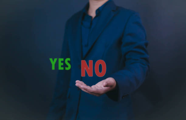 istock Yes or No decision idea. Checklist option communication, Businessman showing  icon message yes noin front, is future decisionof him to decide on your own path. 2188622825