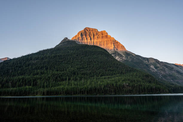 istock Kinnerly Peak Rises Over Upper Kintla Lake And A Dark Green Ridge 2188630256