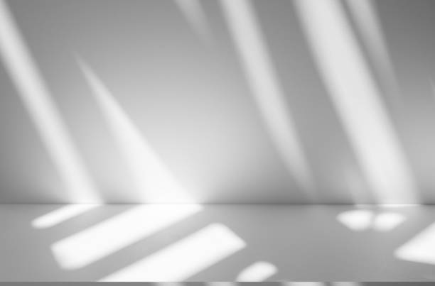 istock Wall interior background, studio and backdrops show products.with shadow from window color white . background for text insertion and presentation product 2188641756