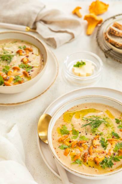 istock Chanterelle soup with bread and butter 2188647692