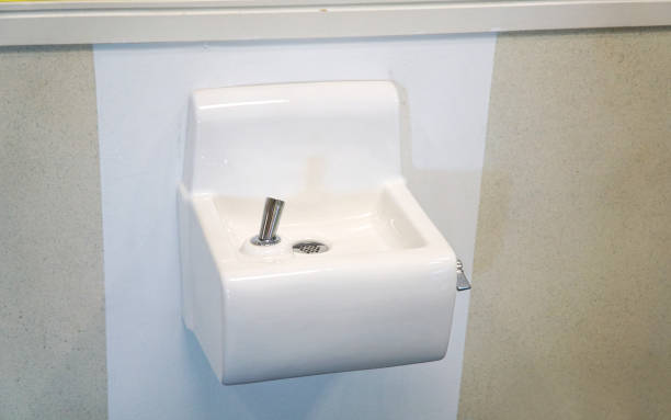 istock close up on drinking water fountain in school 2188649563