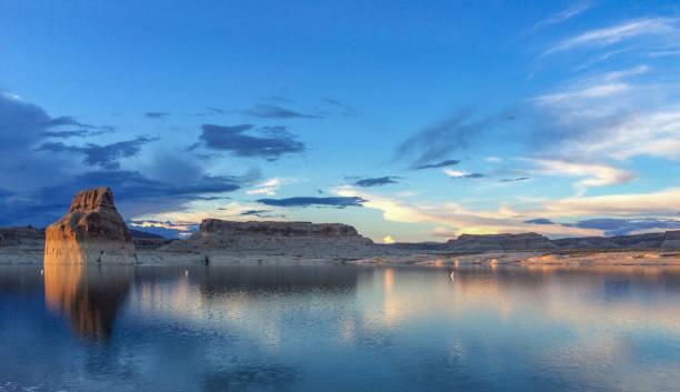 istock Lone Rock Sunset Water Refleciton in Lake Powel Utah 2188649738