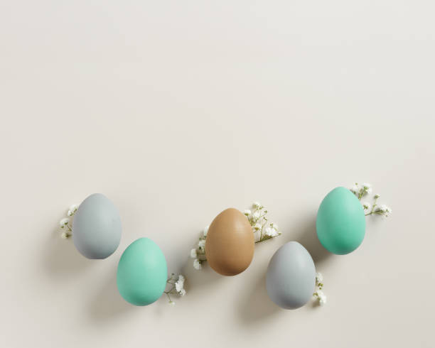 istock Easter Eggs pattern with White Gypsophila flowers on Light beige Background. Dyed colorful eggs in pastel colors, spring holiday photo, tender soft hues, flatly of celebration food and white blooms 2188652068
