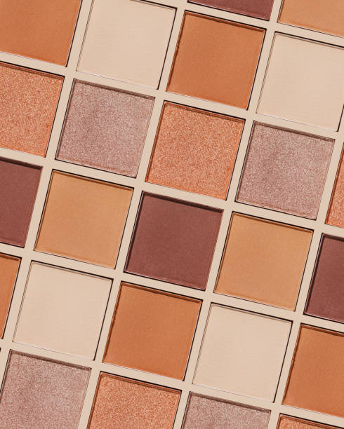 istock Swatches eyeshadow refills as minimal graphic pattern. Matte and glitter pans beige brown copper shade, detailed texture, sun light, minimal trend cosmetics background, beauty product, eye makeup 2188652081