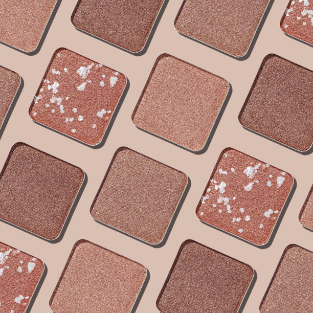 istock Swatches eyeshadow refills as graphic minimal monochrome pattern. Matte and glitter pans beige brown shades, detailed texture, sun light, stylish cosmetics background, beauty product, eye makeup 2188652088