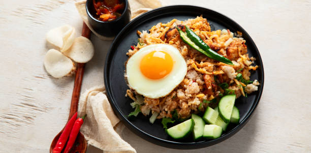istock Nasi goreng- Indonesian fried rice with fried egg. 2188652348
