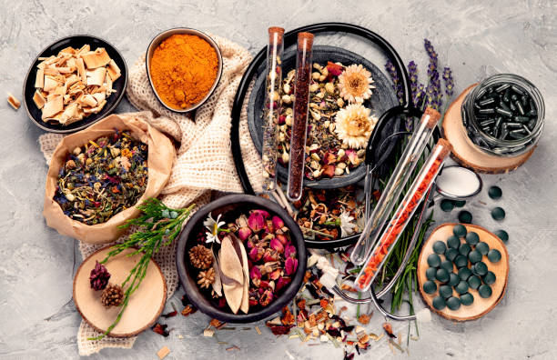 istock Alternative medicine variation pills and herbs. Alternative medicine variation pills and herbs. Homeopathy medicine concept. 2188652959