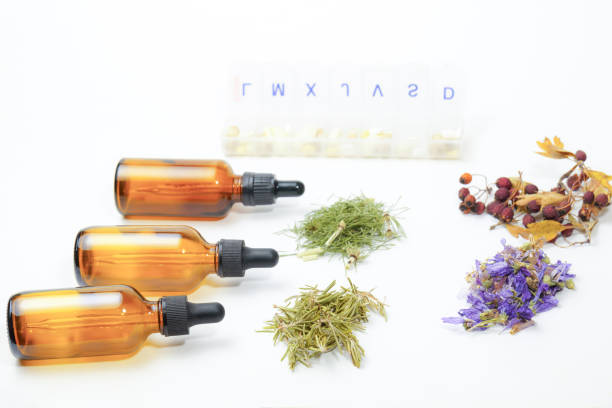 istock group of several medicinal plants next to a box of pills 2188654819