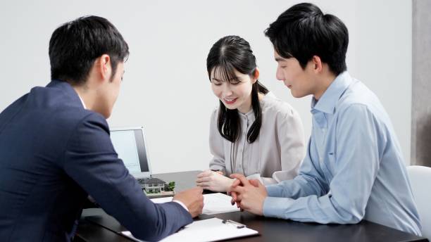 istock A businessman explaining real estate to a customer 2188669132