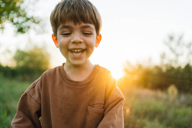 istock Smiling young boy outdoors 2188672831