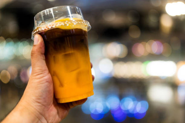 istock Iced orange Americano black coffee in takeaway cup 2188674082