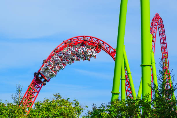 istock Roller coaster up down turn and a passing loop feint, spiral train of trolleys tends to go down. 2188676620