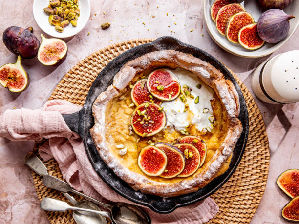 istock Dutch baby pancake with figs and pistachios 2188687489
