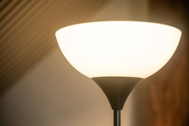 istock Lamp lighting up in cozy room during evening ambience 2188688371