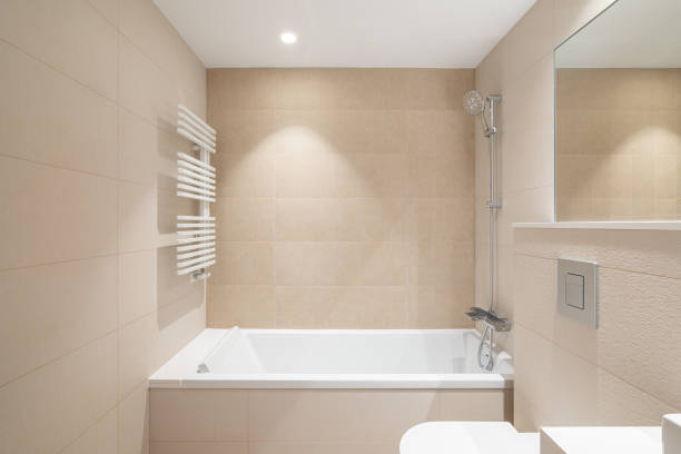 Interior of modern children's bathroom with illuminated mirror