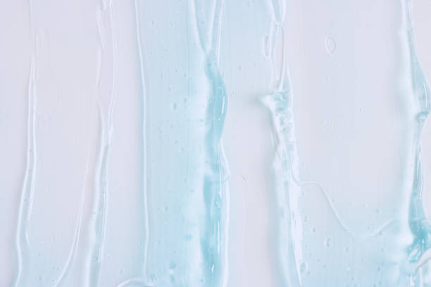 istock Gel blue texture. Clear liquid jelly cosmetic background. 2188692603