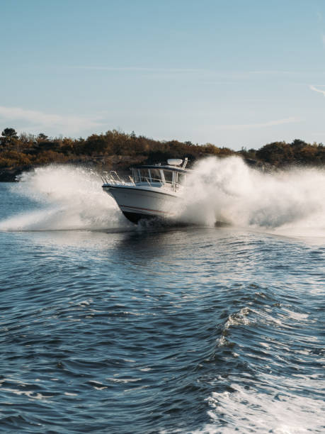 istock Speedboat in navigation goes on the waves in deep blue water, sea view. 2188694784