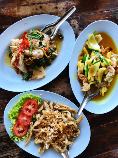 istock Thai food in black bowl on table in restaurant, Thailand. 2188698151
