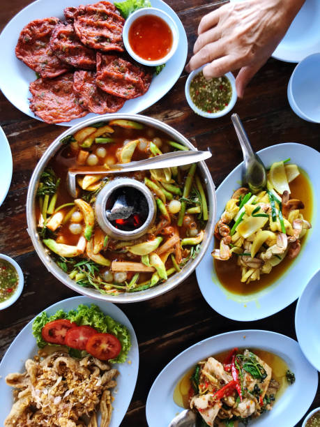 istock Thai style vegetable soup with shrimp, squid, mushroom, and chili 2188698279