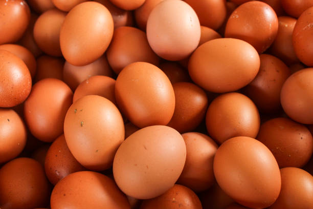 istock Texture and background of organic raw chicken eggs. Chicken eggs cover the frame. 2188703562