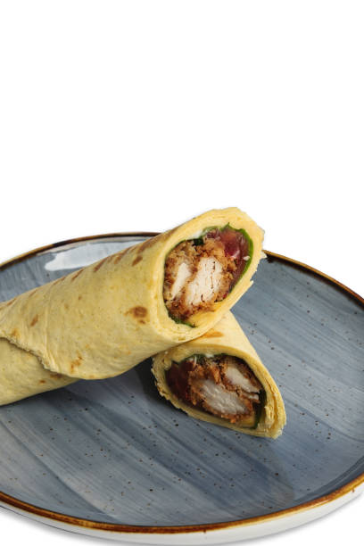 istock Delicious chicken wrap served on a blue plate with a white background 2188704919