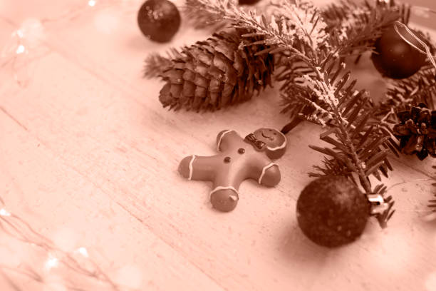 Christmas composition on a white wooden background. Color of the Year Mocha Mousse.