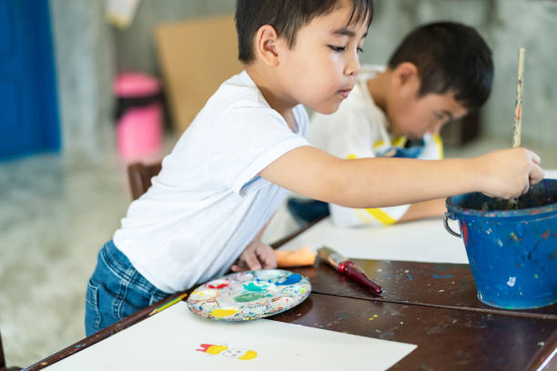 istock Asian children student in art classroom learning, drawing and confidence at the school 2188711629