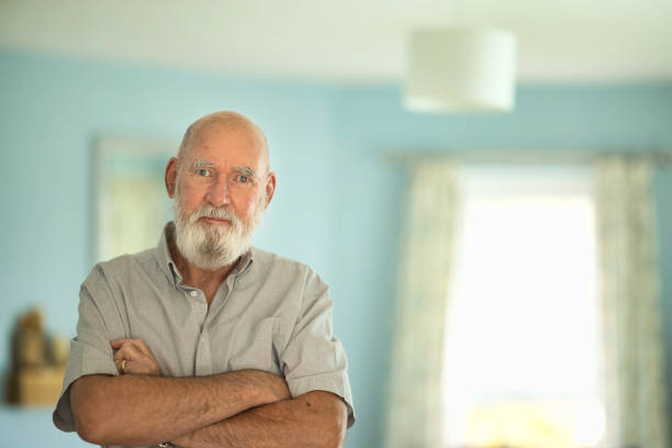 istock Elderly man in his living room 2188720078