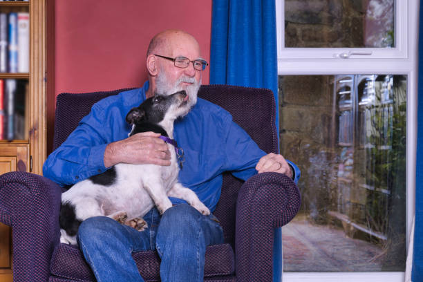istock Man in his 70s with his dog 2188720131