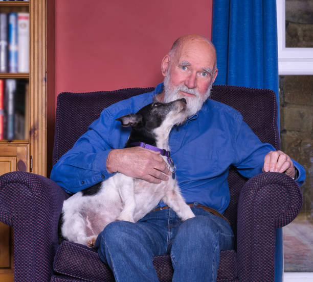 istock Man in his 70s with his dog 2188720233