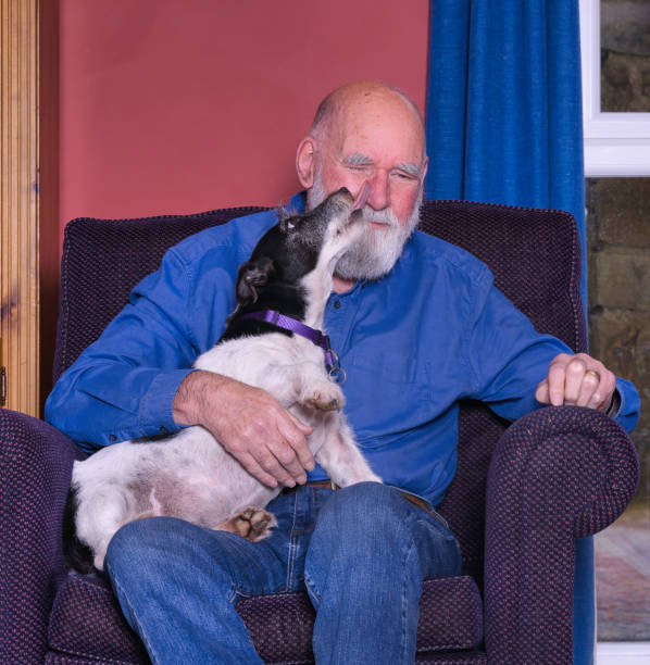 istock Man in his 70s with his dog 2188720631