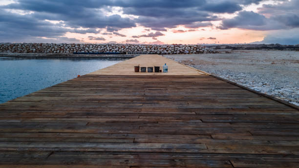 Discover the art of construction blending seamlessly with the beauty of coastal landscapes