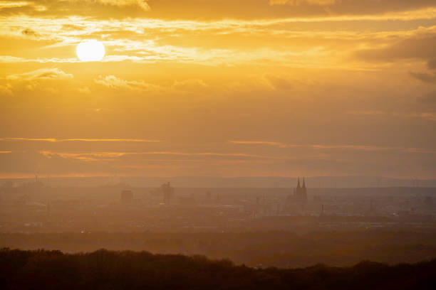 Panoramic image of Cologne with cathedral against sunset, Germany, Europe