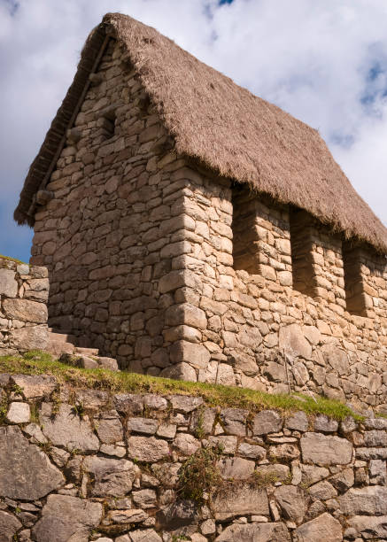 Ancient Stone House with Thatched Roof at Machu Picchu