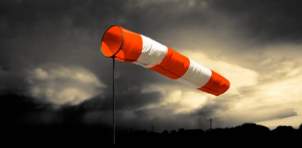 istock A wind vane in front of a stormy sky 2188735544