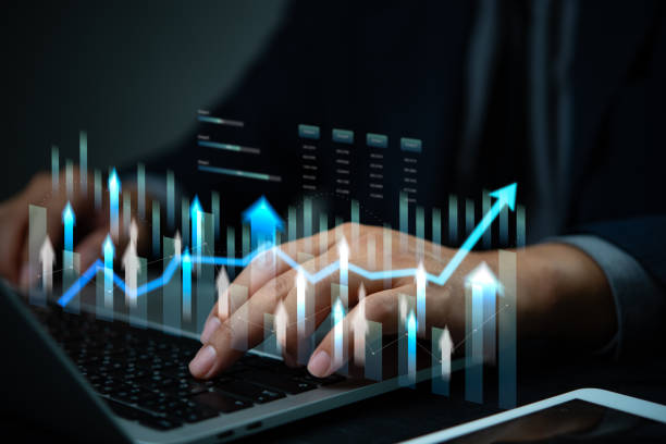 istock Businessman using computer to analysis data with graph and research financial marketing and business growth target plan 2188736842