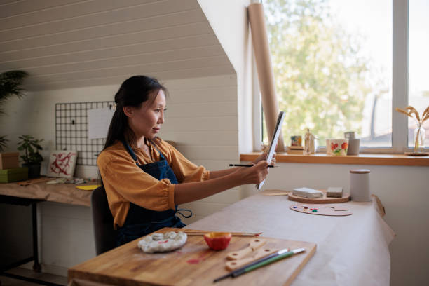 istock Woman Looking at Clay Pottery Sketch 2188738783