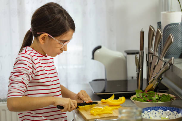 istock Girl preparing food 2188745014