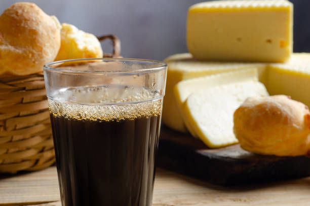 istock Cheese and cheese bread, a beautiful breakfast table with Brazilian delicacies and accessories on rustic wood, selective focus. 2188752309