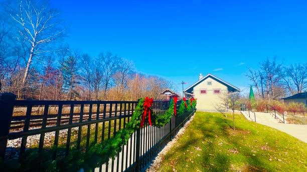 istock Train station on sunny day with blue sky, with holiday destinations. 2188759391