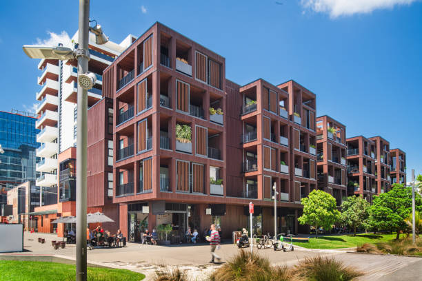 The exterior of a large apartment building, finished in hardwood, in the modern Wynyard district of Auckland, New Zealand.