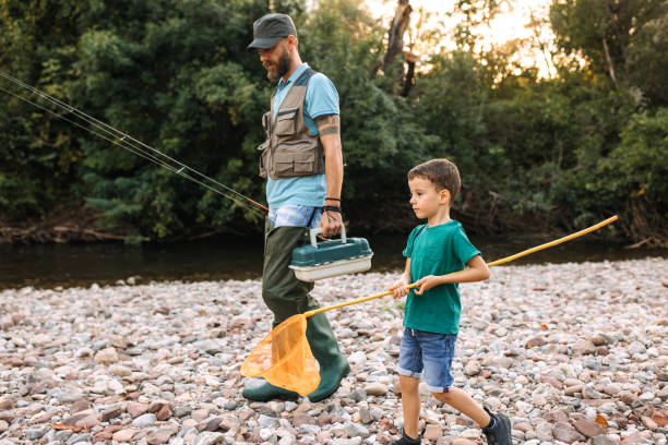 istock Father and son fishermen 2188770886