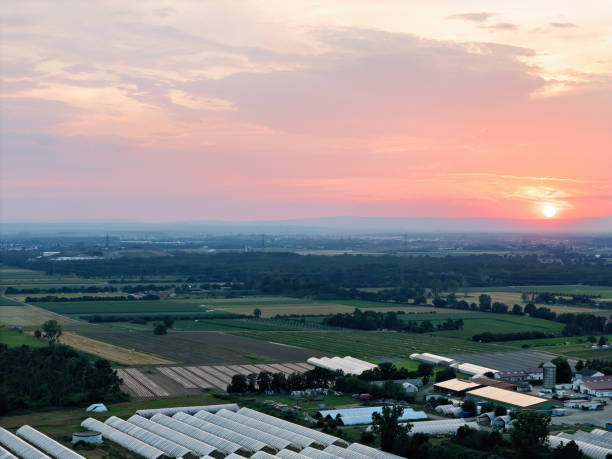 istock Weiterstadt with fields and red sunset in summer, drone shot 2188771729