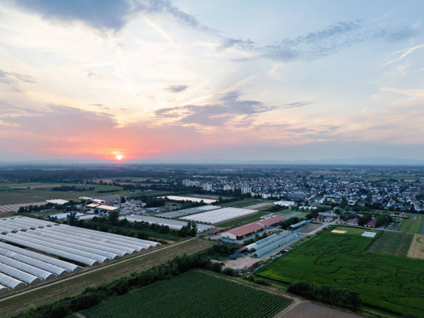 istock Weiterstadt with fields and red sunset in summer, drone shot 2188771732
