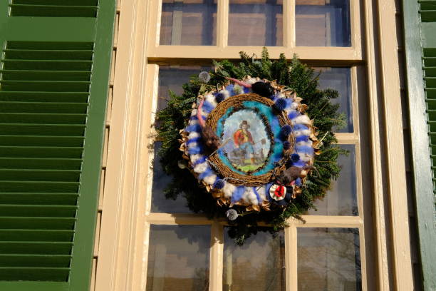 Beautiful Christmas wreaths hanging on the outside of doors.